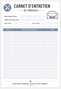 Un carnet d'entretien automobile ouvert avec des notes et dates d'entretien sur une table.